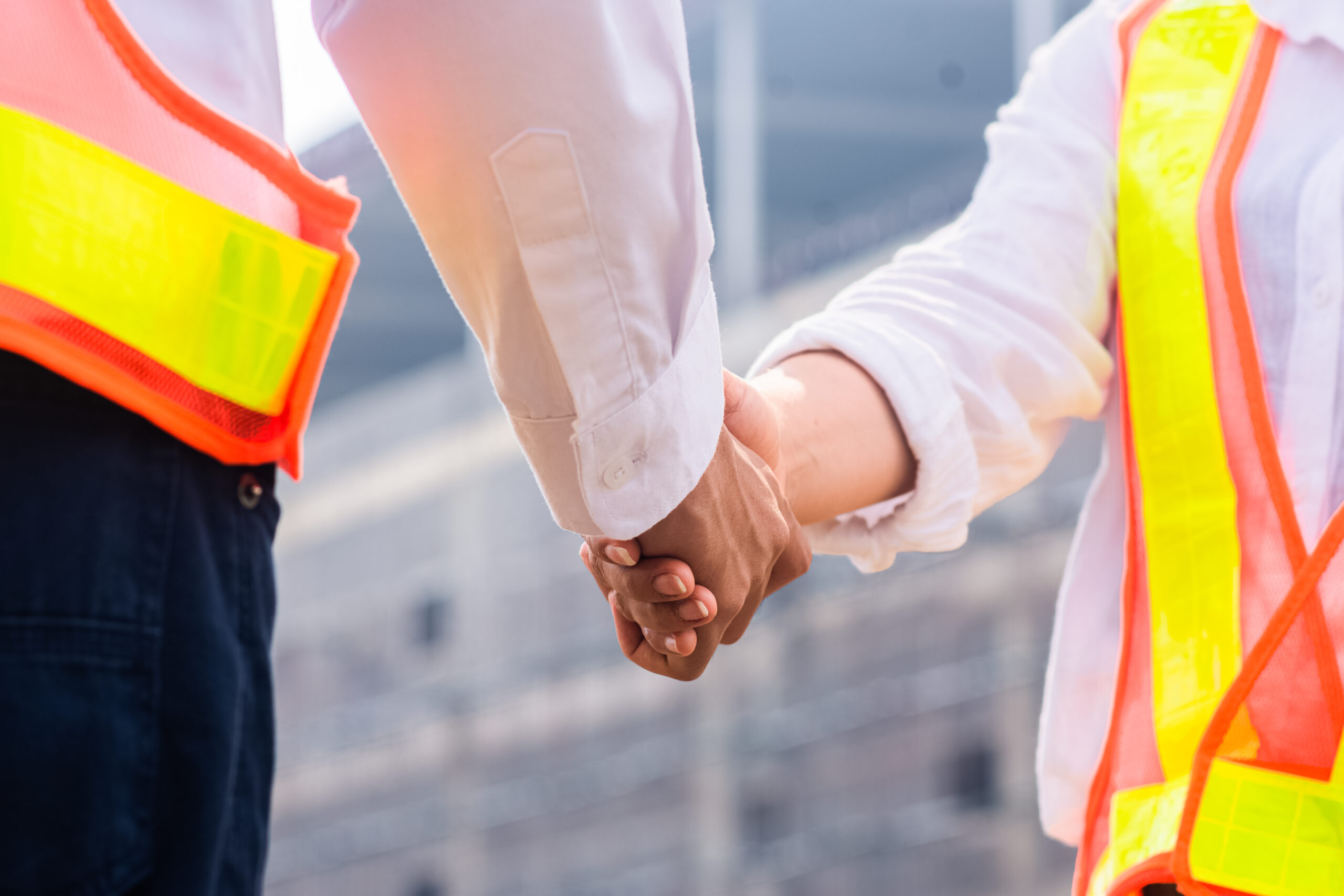 Shake hand teamwork concept, closeup engineer Shake hand teamwork construction site background, Shake hand teamwork for team background